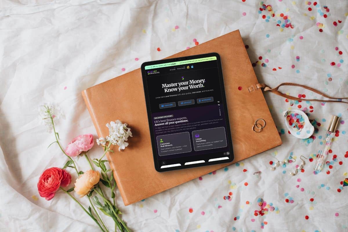 Tablet on folder while browsing Let’s Get Financial website